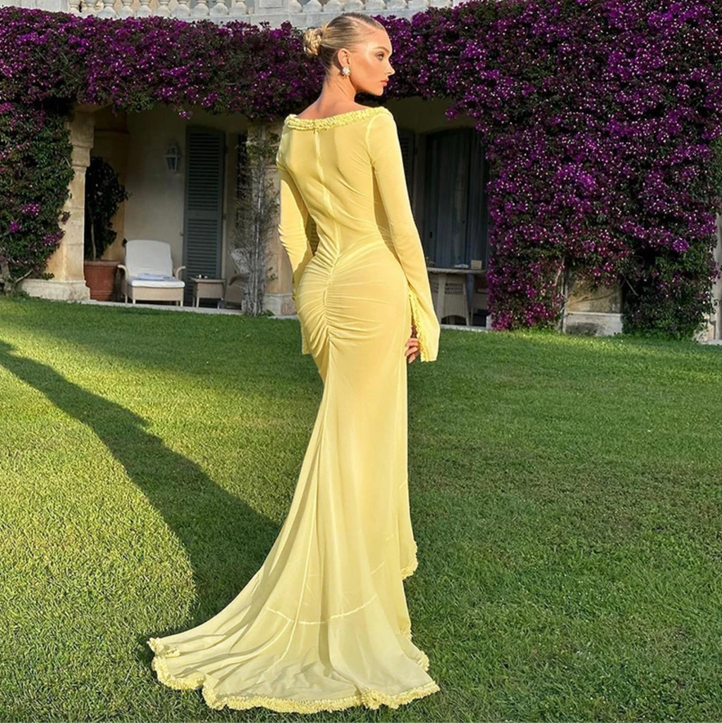 Transform your wardrobe with the captivating Dress Hilma. This sheer long dress boasts a sexy see-through design and elegant long sleeves, adding a touch of allure and sophistication to any occasion. Embrace your inner confidence and make a statement with this stunning gown.
