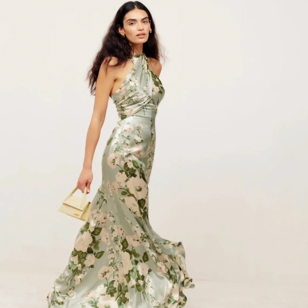 Robe Fanya is ideal for those special occasions. Crafted with luxurious fabrics and intricate floral prints, this flowing, hanging neck dress boasts backless details that delicately reveal the beauty of the summer season. With a unique temperament and tasteful elegance, Fanya will make you stand out from the crowd.