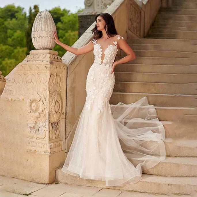 Robe Royalty creates a look fit for royalty. With its sleeveless silhouette, round neckline, and wedding gown with button accent, you'll feel like you're walking down the aisle in style. Slip into this timeless, romantic design and be the queen of the ball.
