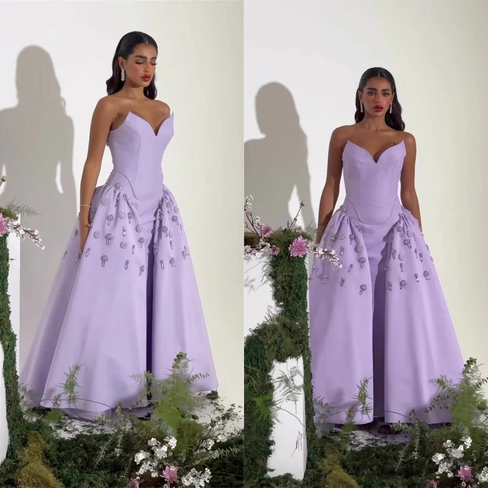 Rule the night in Dress Zaina. This elegant sweetheart ball gown will make you feel like royalty as you dance the night away. With its floor length and rhinestone applique design, this satin dress is perfect for any formal occasion. Take a risk and stand out in the stunning Zaina!
