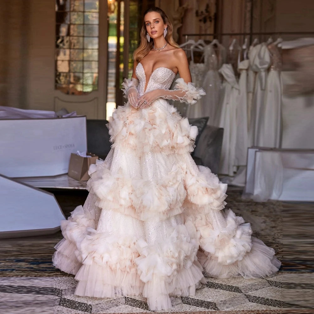 Introducing our Dress Danica, a masterpiece of elegance. This off-white floor length evening dress features a sweetheart neckline, ruffled details, and a flattering silhouette that will make you the center of attention. Perfect for special occasions and formal events.