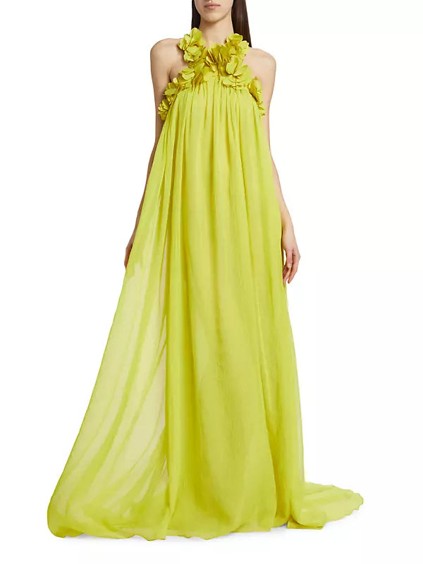 This stunning chiffon gown features hand-embroidered floral appliqués, adding delicate and intricate detail. The PatBO brand exudes luxury and elegance, making this dress a must-have for any special occasion. Make a statement and feel like a true fashionista with this mesmerizing dress!