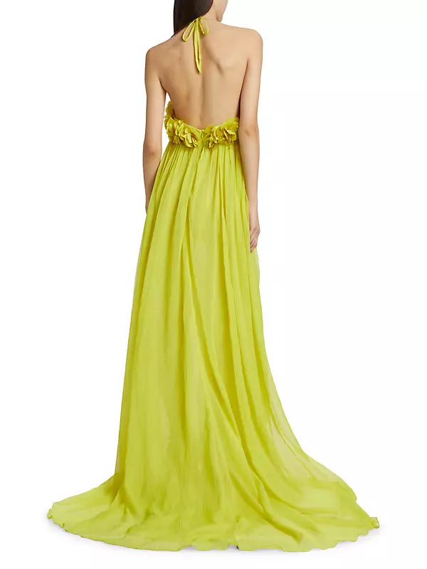 This stunning chiffon gown features hand-embroidered floral appliqués, adding delicate and intricate detail. The PatBO brand exudes luxury and elegance, making this dress a must-have for any special occasion. Make a statement and feel like a true fashionista with this mesmerizing dress!