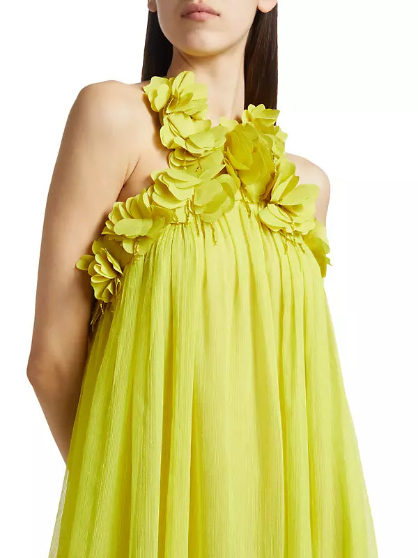 This stunning chiffon gown features hand-embroidered floral appliqués, adding delicate and intricate detail. The PatBO brand exudes luxury and elegance, making this dress a must-have for any special occasion. Make a statement and feel like a true fashionista with this mesmerizing dress!