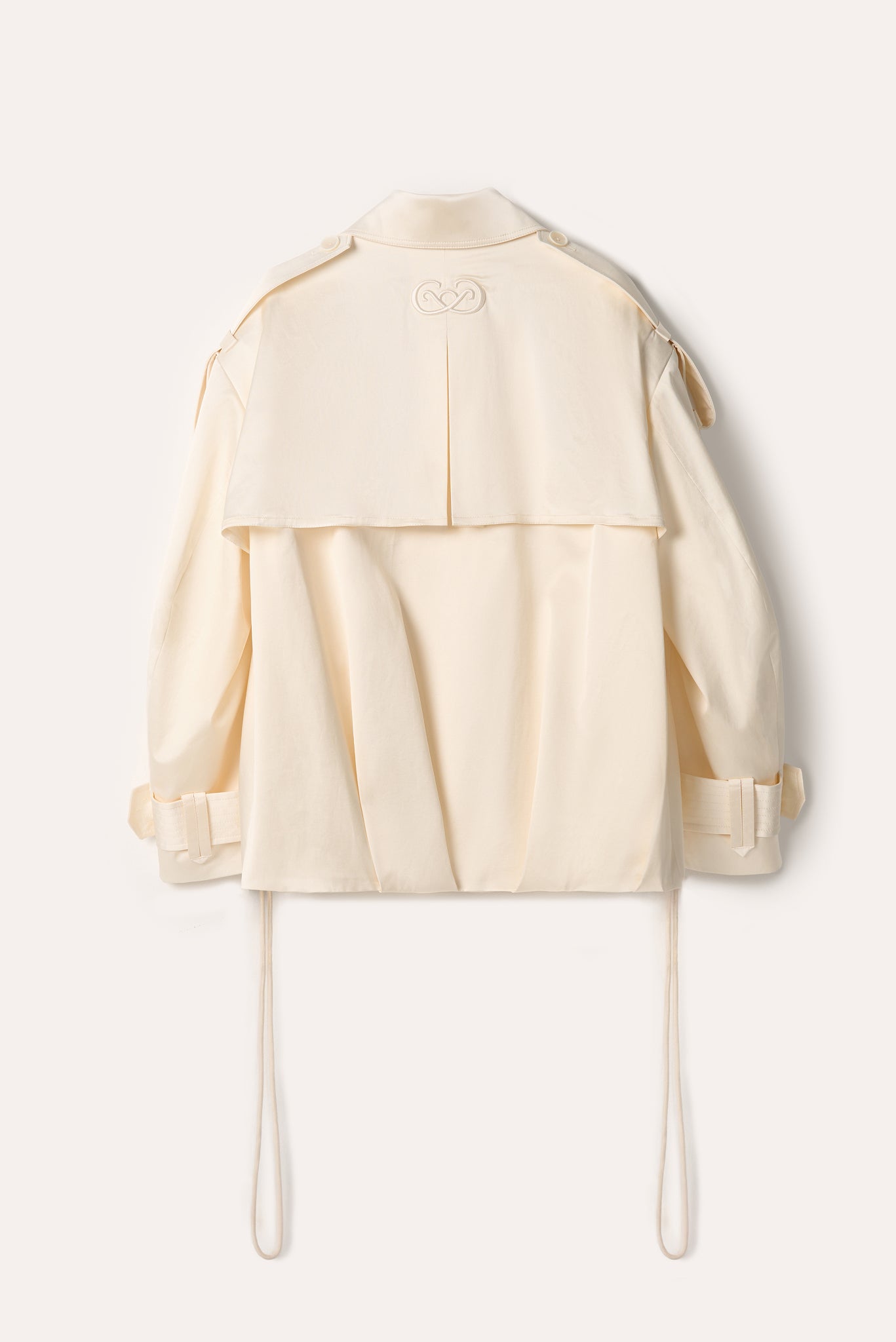 The Pentimento Trench Coat offers a timeless design that embraces change and evolution, much like the artistic concept it’s named after. Crafted with thoughtful details that adapt to your style, this coat transforms your look effortlessly while providing comfort and sophistication. Make a statement by wearing a piece that celebrates thoughtful reinvention and enduring elegance.