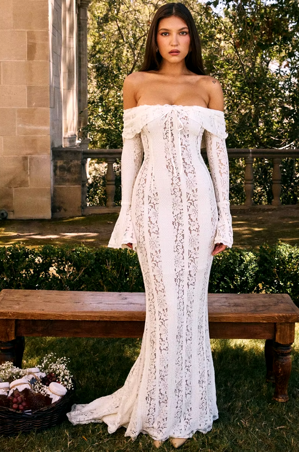 Indulge in luxury with the Belle Maxi Dress. This elegant piece features a vintage cream floral lace design, showcasing a delicate and sophisticated off shoulder style. Perfect for making a statement at any event, this maxi dress radiates beauty and exclusivity. Elevate your wardrobe with this timeless and refined piece.