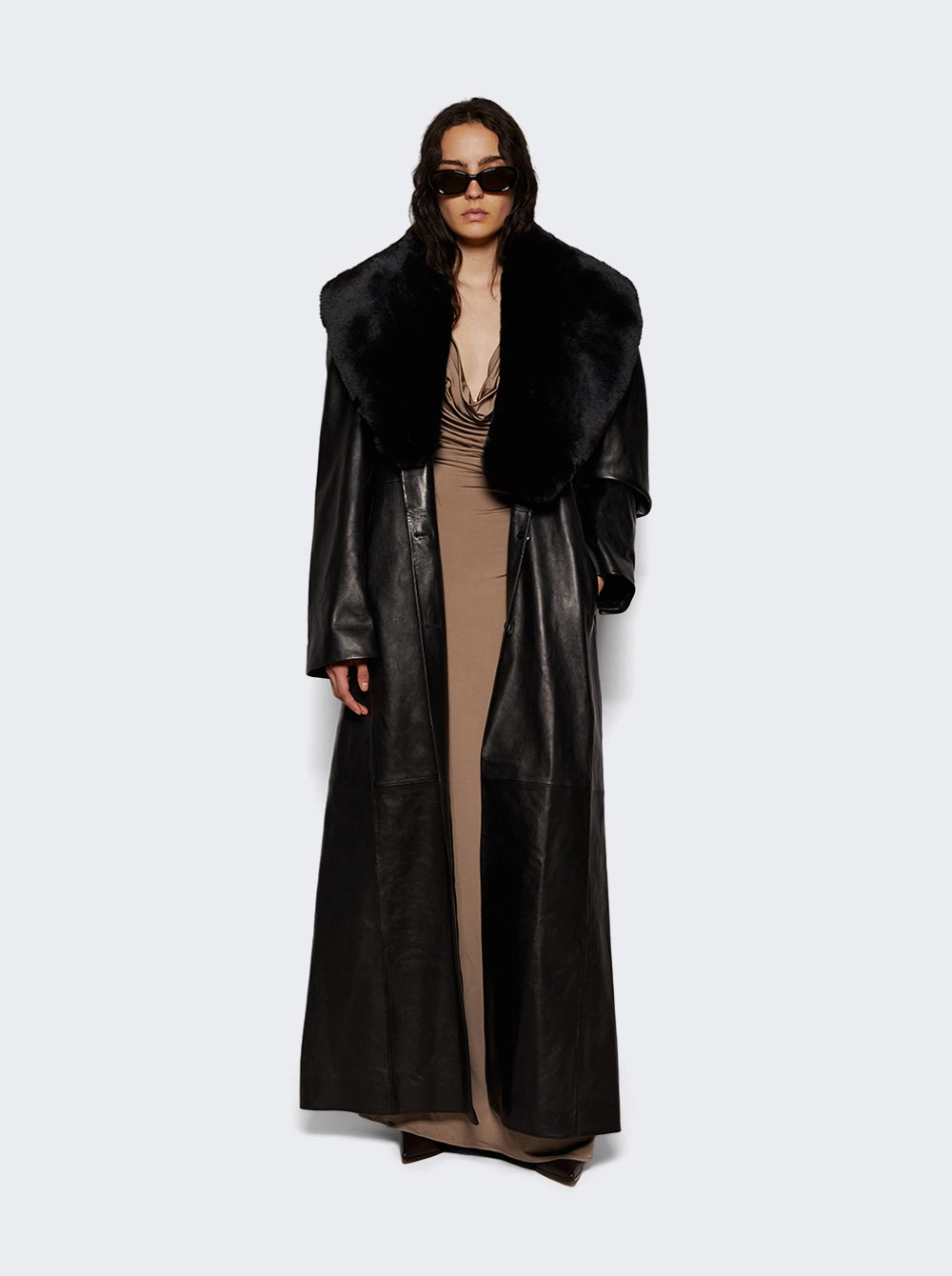 Add a touch of elegance to your wardrobe with the Cowl Neck Jersey Midi Dress by Magda Butrym! The jersey fit and cowl neck design create a flattering silhouette, while the high slit and flower detail add a touch of sophistication. Perfect for any occasion, this dress will make you feel confident and stylish.