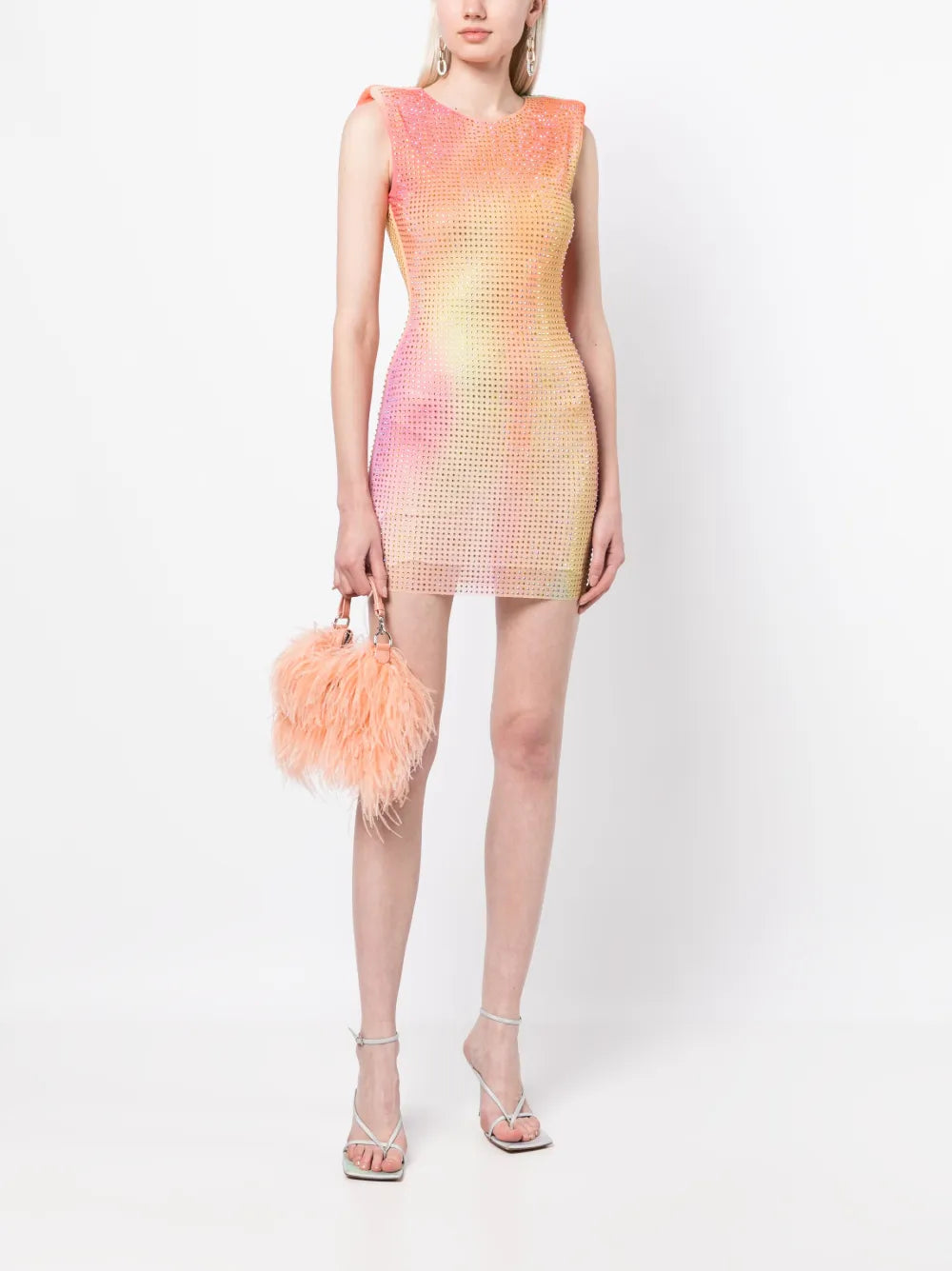 Be the talk of the party in the stunning Rhinestone-embellished Mini Dress by Self-Portrait. Made in Italy with a multicolor design and sparkling rhinestone embellishments, this dress will turn heads and make you shine. With a semi-sheer construction, sleeveless design, and shoulder pads for added structure, it features a round neck and thigh-length for a chic, sophisticated look. Button fastening in the back completes this must-have dress.