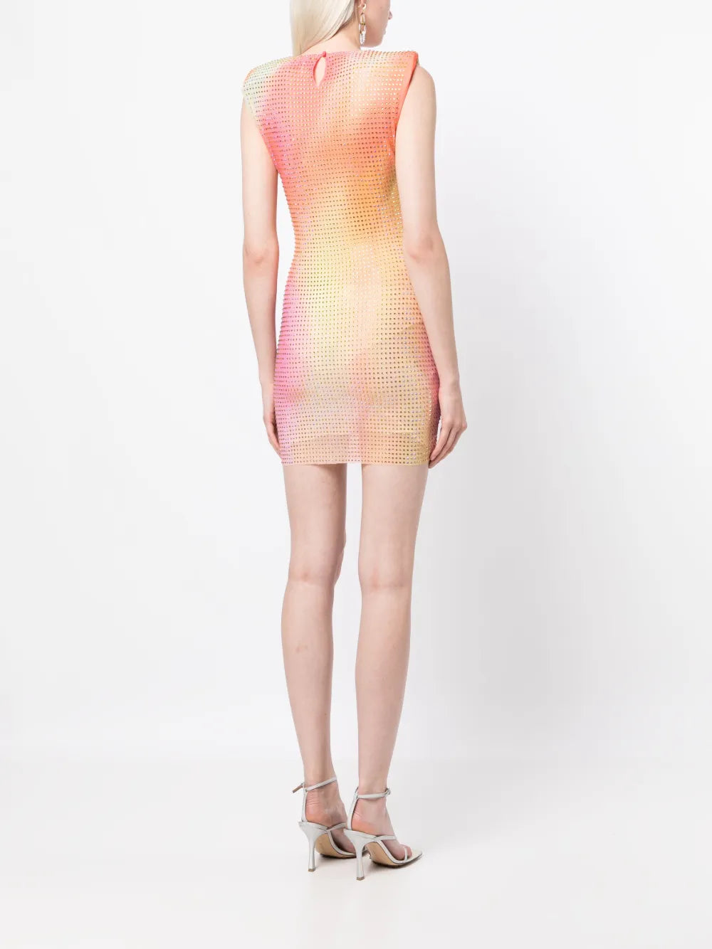 Be the talk of the party in the stunning Rhinestone-embellished Mini Dress by Self-Portrait. Made in Italy with a multicolor design and sparkling rhinestone embellishments, this dress will turn heads and make you shine. With a semi-sheer construction, sleeveless design, and shoulder pads for added structure, it features a round neck and thigh-length for a chic, sophisticated look. Button fastening in the back completes this must-have dress.