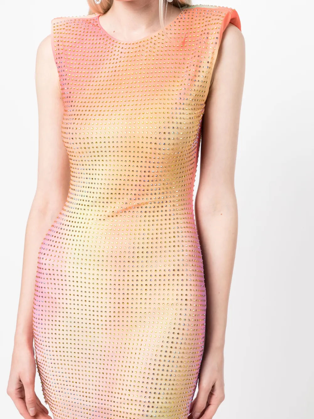 Be the talk of the party in the stunning Rhinestone-embellished Mini Dress by Self-Portrait. Made in Italy with a multicolor design and sparkling rhinestone embellishments, this dress will turn heads and make you shine. With a semi-sheer construction, sleeveless design, and shoulder pads for added structure, it features a round neck and thigh-length for a chic, sophisticated look. Button fastening in the back completes this must-have dress.