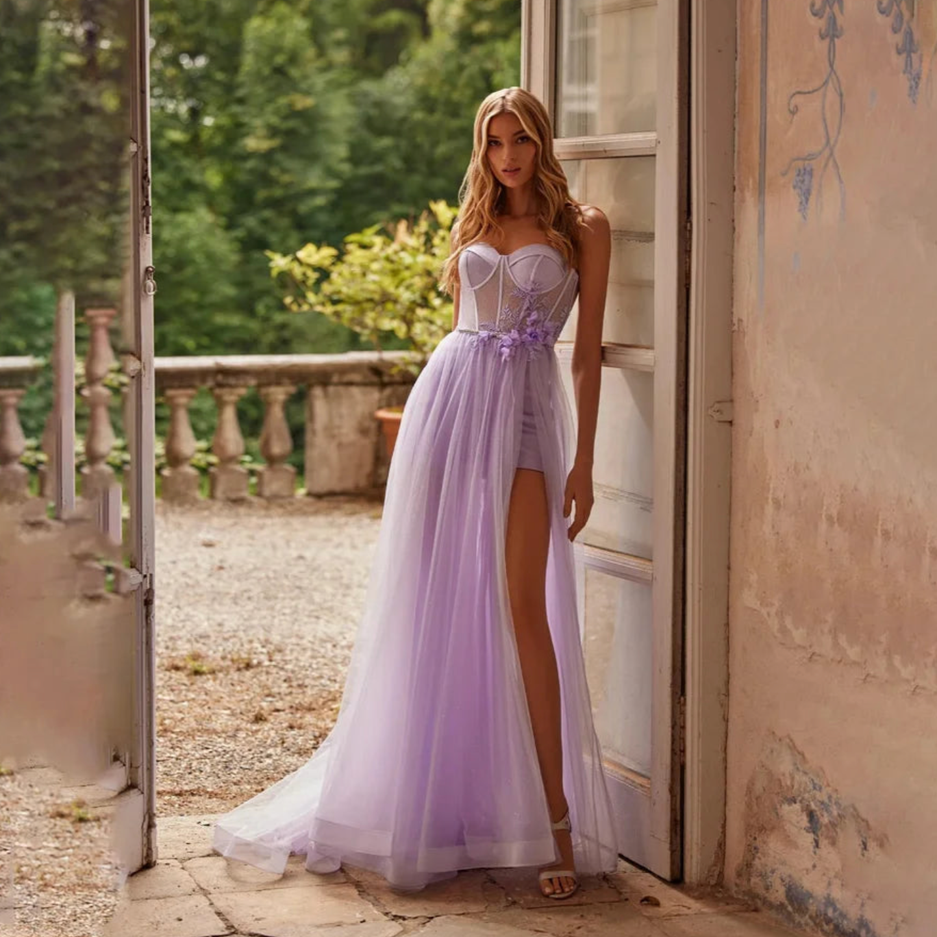 Indulge in a Floral Fantasy with our stunning Jeaninne Robe. The glamorous sequin tulle evening gown features a sexy high-split design for a stunning silhouette. Show off your feminine side with the illusion prom dress, perfect for any formal occasion. You'll be the talk of the night.