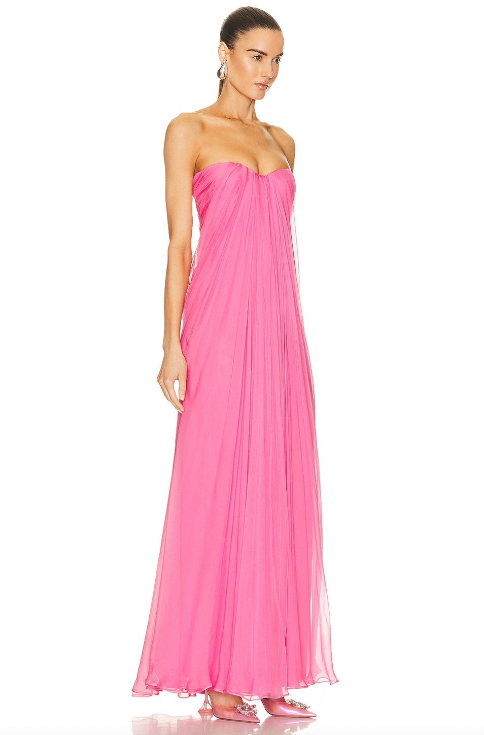 Get ready to turn heads in this stunning McQueen Draped Bustier Dress in Sugar Pink! The beautifully draped bustier adds a touch of elegance, while the striking color is sure to make a statement. Perfect for special occasions, this dress will make you feel confident and glamorous.