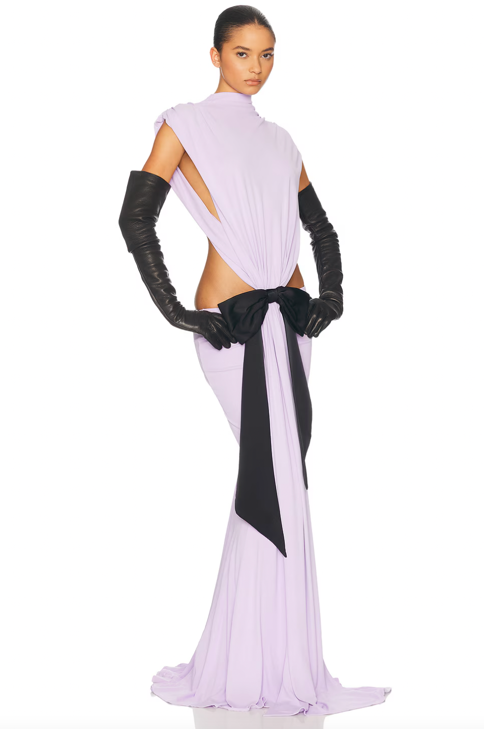 Elevate your wardrobe with The Constantina Jersey Dress With Bow, designed for effortless elegance. Made from soft jersey fabric, it features a flattering pull-on style with unique cut-out details at the back and waist for a modern touch. Partially lined for comfort, the dress is finished with a delicate satin bow that adds a hint of sophistication. Ideal for special occasions, this dress combines style and comfort perfectly, making it a versatile addition to your collection. 