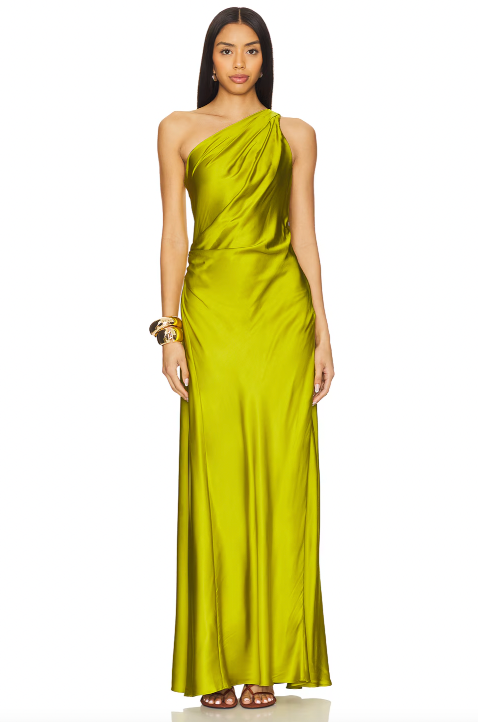 The Aster Satin One Shoulder Gown features a fully lined interior for optimal comfort and structure. Its hidden side zipper ensures a seamless silhouette, while the ruffled satin fabric adds sophisticated texture and movement. Perfect for formal occasions, this gown combines elegant design with practical details for a refined look.