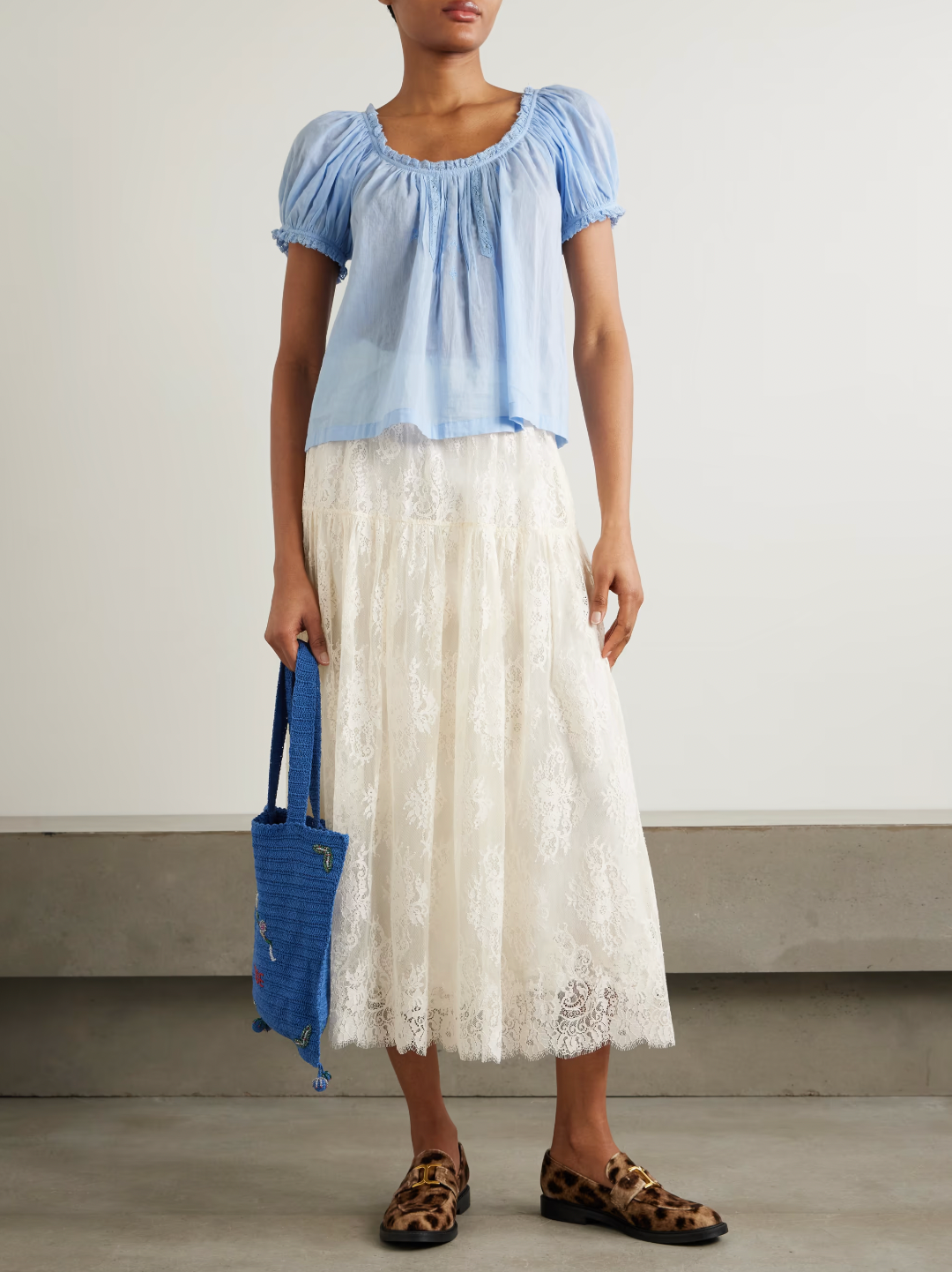 Elevate your wardrobe with the Sebastiane tiered lace midi skirt by Doen—a sophisticated piece that effortlessly transitions from day to evening. Crafted with delicate layered lace, this midi skirt offers romantic elegance with a modern silhouette that flatters every figure. The tiered design creates beautiful movement and dimension, while the midi length provides versatile styling options for any occasion. 