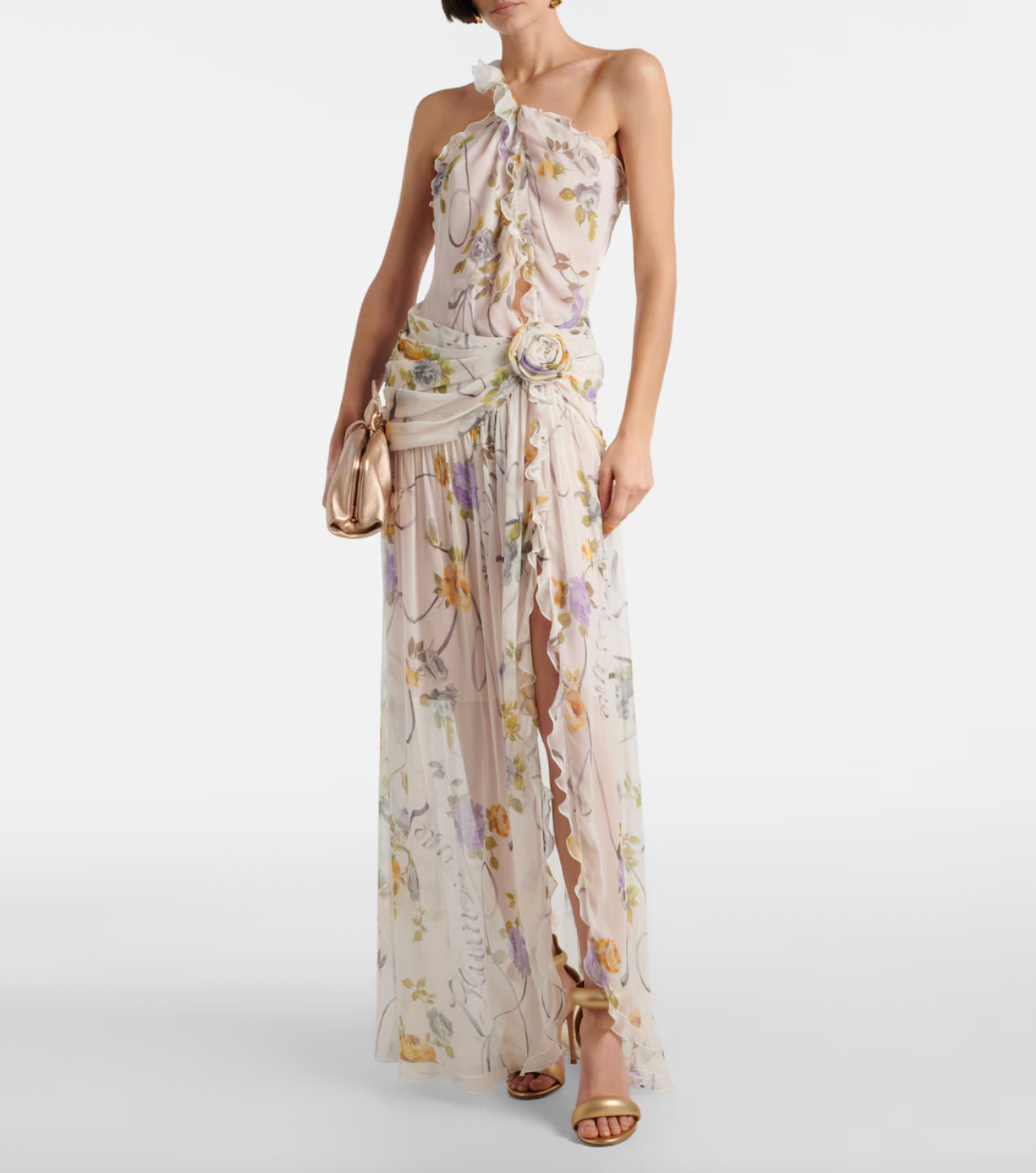 Step into a garden of elegance with this Floral Silk Creponne Maxi Dress by Blumarine. Its flowing silk fabric drapes beautifully, while vibrant floral patterns add a touch of whimsy. Perfect for dancing through sunny days or dreamy evenings, this dress combines comfort with effortless charm to brighten any occasion.