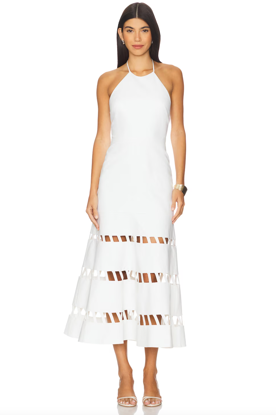 The Janessa Dress by Alexis blends timeless comfort with chic modern design. Crafted from breathable cotton, it keeps you cool and comfortable all day. The elegant halter neckline and midi length offer versatile styling for any warm-weather event. Unique cut-out ladder detailing adds a sophisticated texture, elevating your look effortlessly. Perfect for those seeking a refined yet comfortable dress.