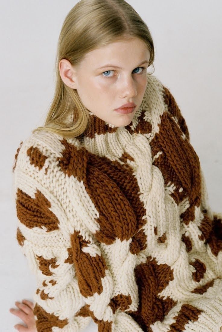 Discover understated sophistication with our Crochet Cow Sweater, where artisanal craftsmanship meets modern sensibility. This exquisite high-neck jumper showcases intricate knitted patchwork and a charming cow print that elevates your everyday style. The carefully constructed silhouette delivers exceptional comfort without compromising elegance, making it equally suited for relaxed weekends or polished layering.