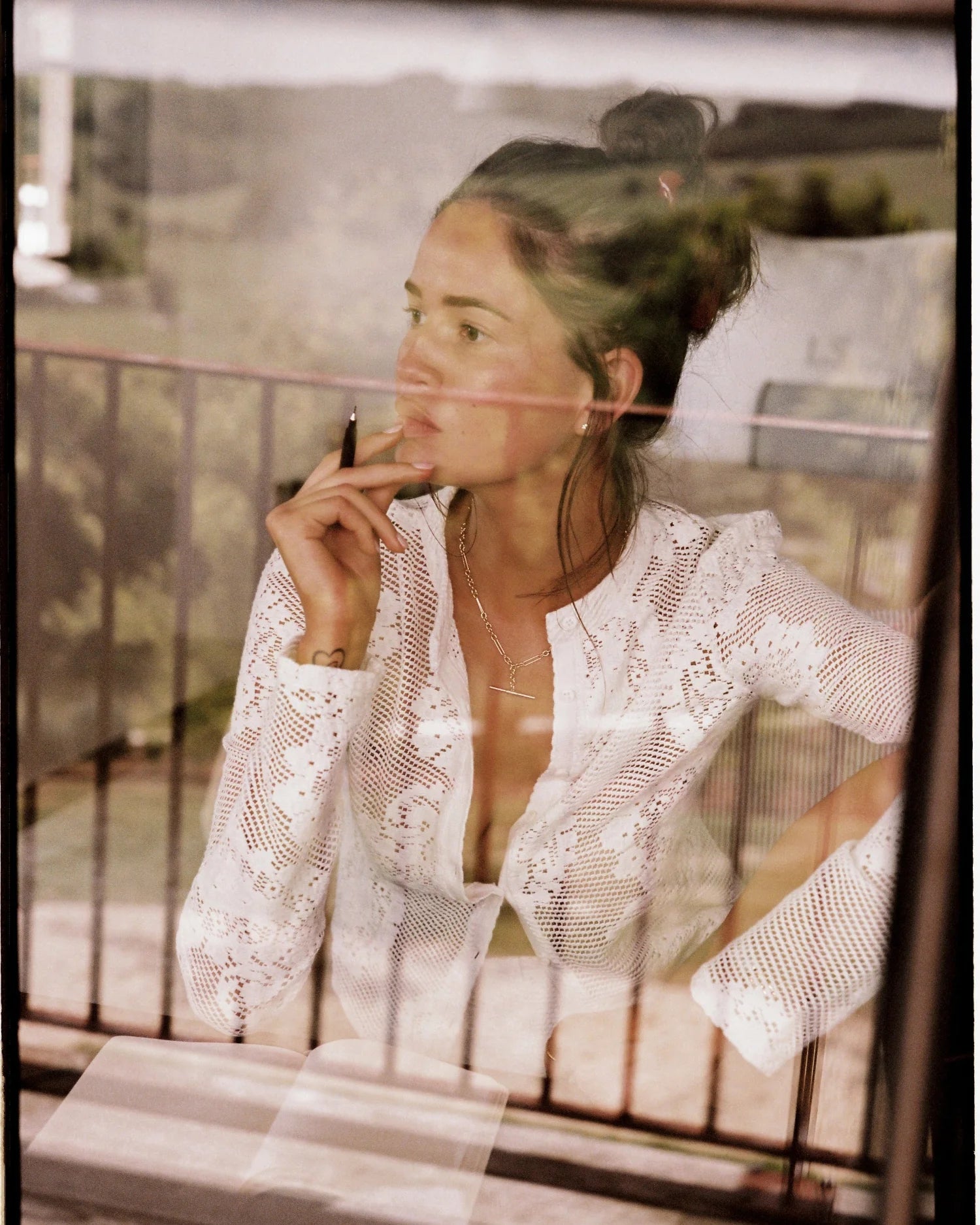 Elevate your wardrobe with the Dom Cardigan, a refined long-sleeve piece crafted for effortless elegance. Featuring a button-up front and a sleek neckline collar, its delicate scalloped trim and custom hand-drawn crochet lace detail add a touch of sophistication. Perfect for layering, this cardigan blends classic design with artisanal craftsmanship to enhance any outfit with subtle grace.