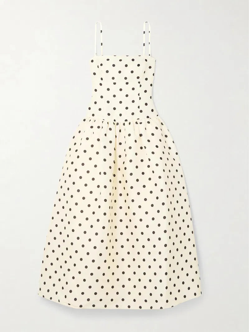 Embrace timeless elegance with this Polka-dot taffeta midi dress inspired by classic 1950s fashion. The luxurious taffeta fabric shines subtly, while the structured bodice and gathered waist beautifully highlight a full, flattering skirt. Perfect for making a graceful statement, pair it with point-toe pumps to complete your vintage-chic look.