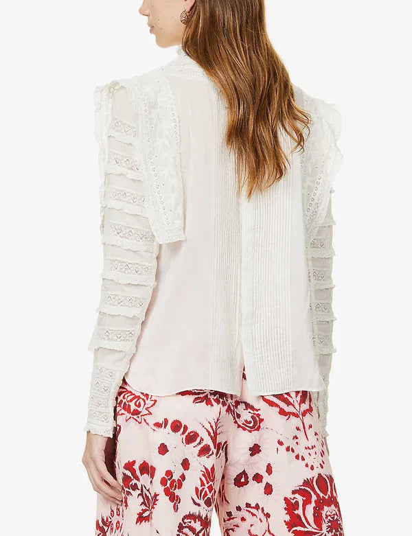 Upgrade your wardrobe with your new favorite top - the Giulia Ruffled Embroidered Cotton-Blend Blouse! Crafted from a luxurious cotton and silk blend, this blouse features delicate broderie anglaise details at the neckline and charming ruffle trim. Each wear will bring a touch of whimsy and romance to your day.