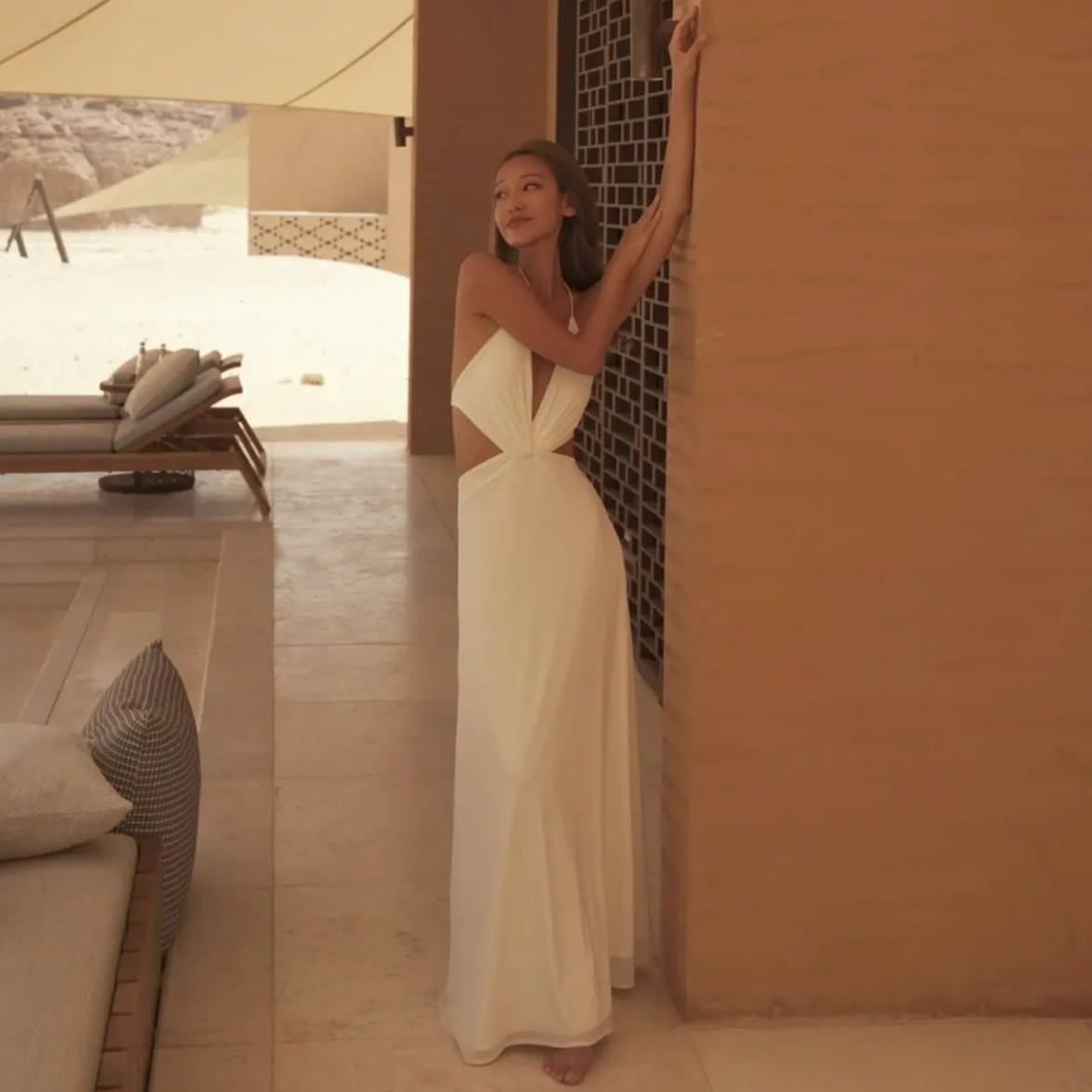 Unleash your pure desire for fashion with the Elsa Maxi Dress. This French Deep V-Neck Twisted Hollow Out Dress exudes a playful summer style, perfect for vacations. With its sexy design, you'll be the center of attention wherever you go. Don't miss out on this must-have piece for your wardrobe!