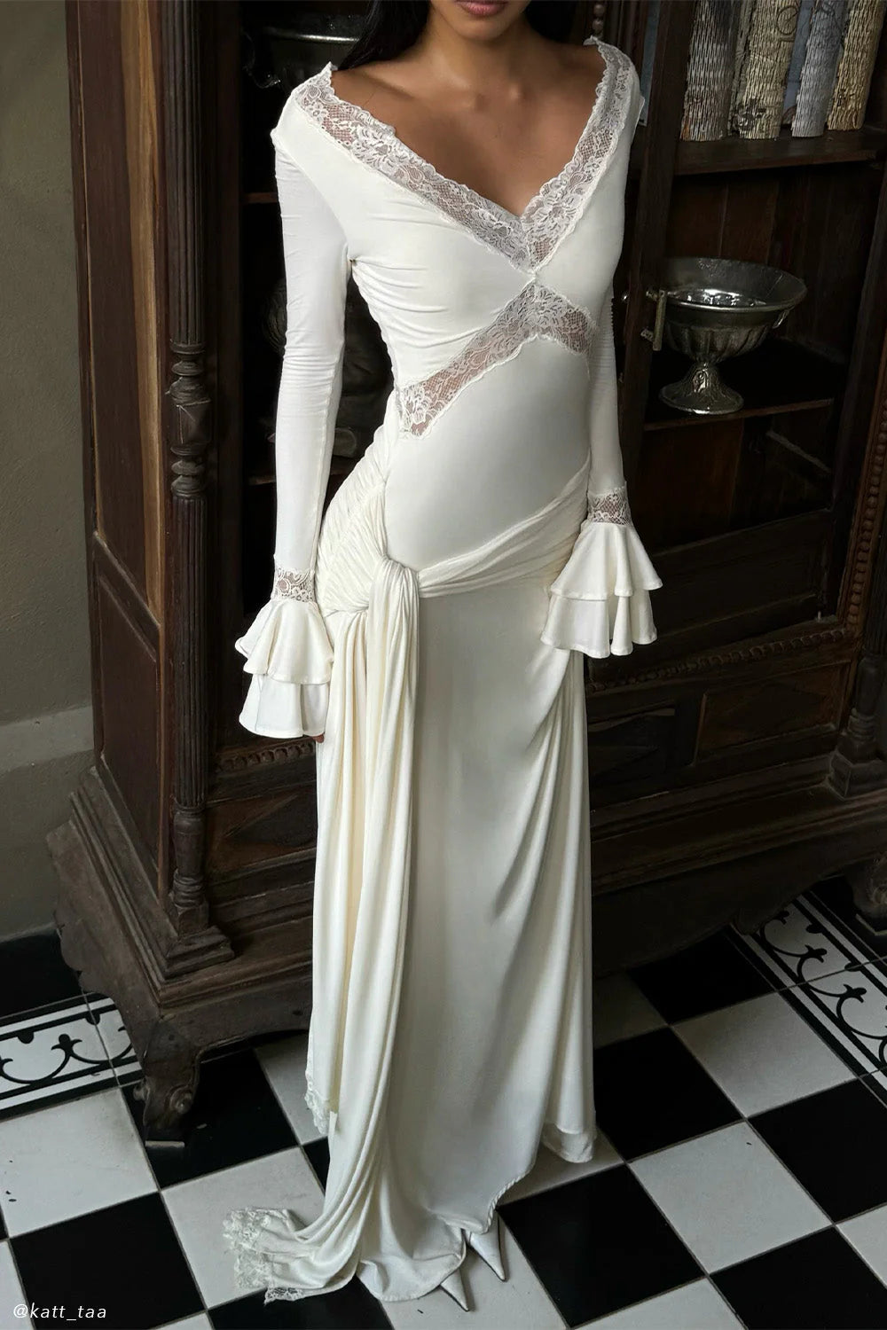 The Electra dress offers a stunning blend of elegance and allure with its fitted silhouette and intricate lace detailing. Featuring a deep V lace neckline and delicate cut-outs, this dress exudes sophistication while the cascading front-side tie adds fluidity to your movement. Flared layered sleeves contribute a vintage-inspired charm, and the partial lining ensures both comfort and style. Ideal for evening occasions, the Electra dress makes a bold and graceful statement that leaves a lasting impression.