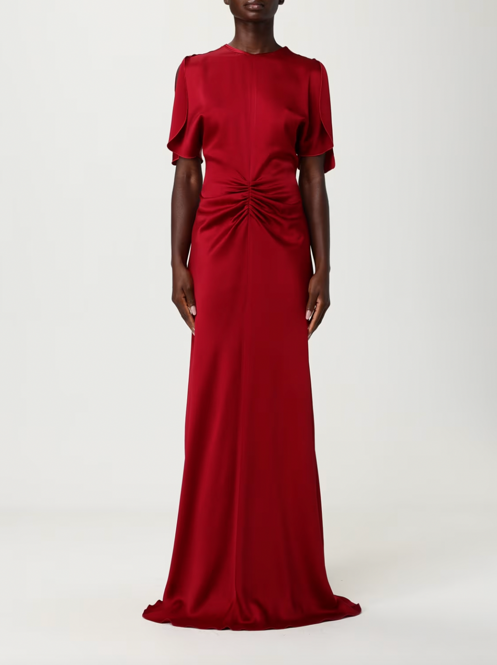 Elevate your evening wardrobe with this sophisticated floor-length dress by Victoria Beckham, designed for those who appreciate refined elegance. The gracefully gathered waist creates a flattering silhouette while the sleek crewneck and regular shoulders offer timeless appeal. A discreet back zip closure ensures a seamless fit, while the straight hemline provides a polished finish that skims the floor with understated grace. 