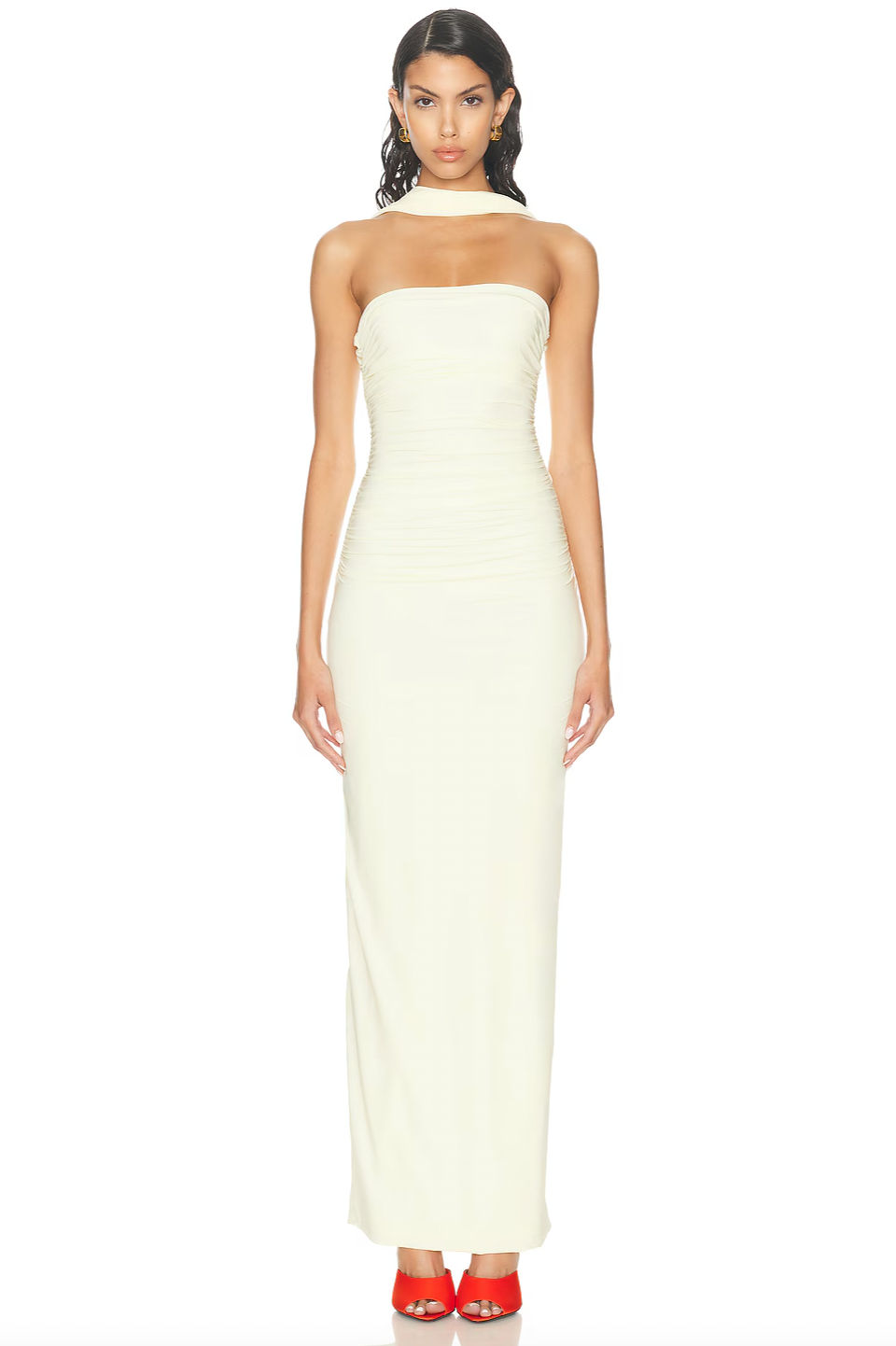 Discover the Maygel Coronel Mullett Dress—a captivating pale yellow maxi that commands attention with its sleek, body-skimming silhouette and daring knotted open back. Crafted from luxuriously smooth fabric, this piece exudes understated elegance while making a bold statement. Whether you're attending a summer soirée or an upscale cocktail gathering, this versatile dress transitions effortlessly from evening glamour to refined daytime sophistication. 