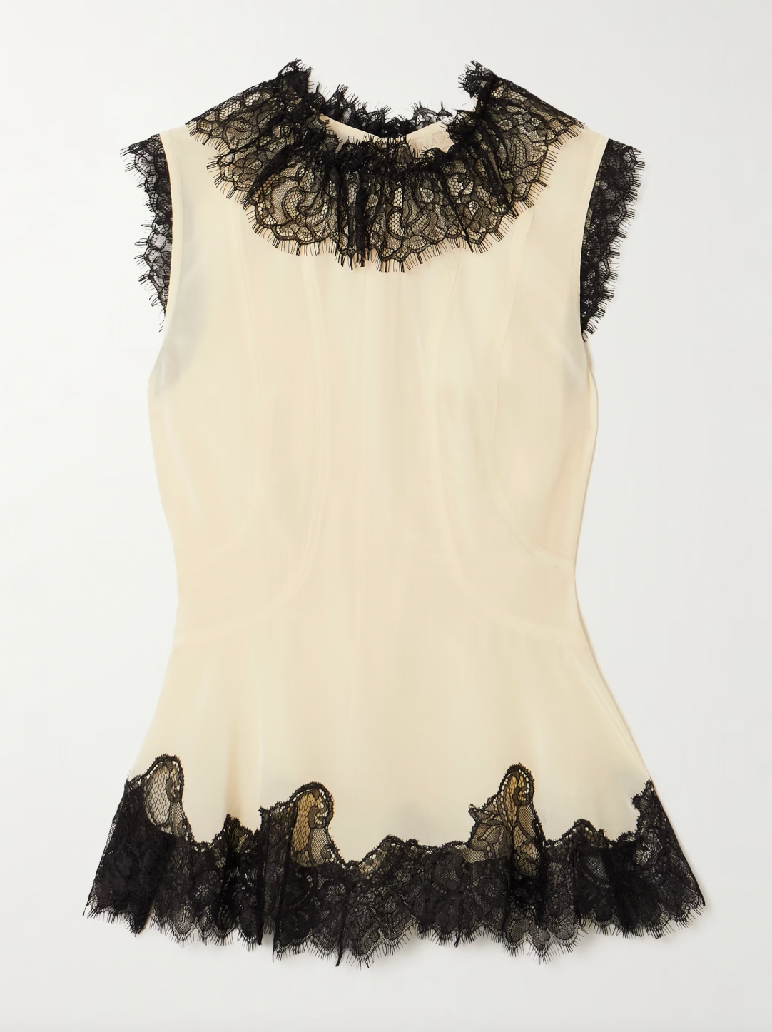 The Bette Silk Top from Ulla Johnson combines elegant craftsmanship with versatile style. Crafted from luxurious silk crepe de chine, this slim-fit top features delicate lace trim and curved seams that flatter your silhouette. Perfect when paired with the matching Rosine skirt or worn casually with jeans, it effortlessly elevates any outfit with refined sophistication.