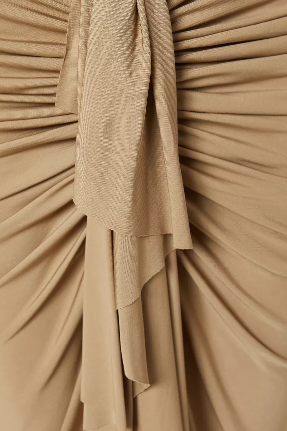 Indulge in the effortless elegance of the Vivenda draped dress from Christopher Esber. This maxi dress, crafted from lightweight viscose fabric, boasts stunning artful draping and cut-out details for a sculptural and modern look. Make a statement with this slim-fitting piece that embodies the designer's contemporary aesthetic.