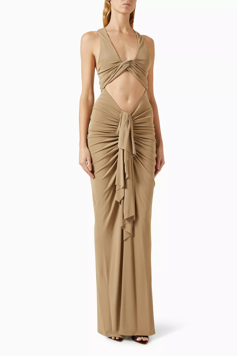 Indulge in the effortless elegance of the Vivenda draped dress from Christopher Esber. This maxi dress, crafted from lightweight viscose fabric, boasts stunning artful draping and cut-out details for a sculptural and modern look. Make a statement with this slim-fitting piece that embodies the designer's contemporary aesthetic.