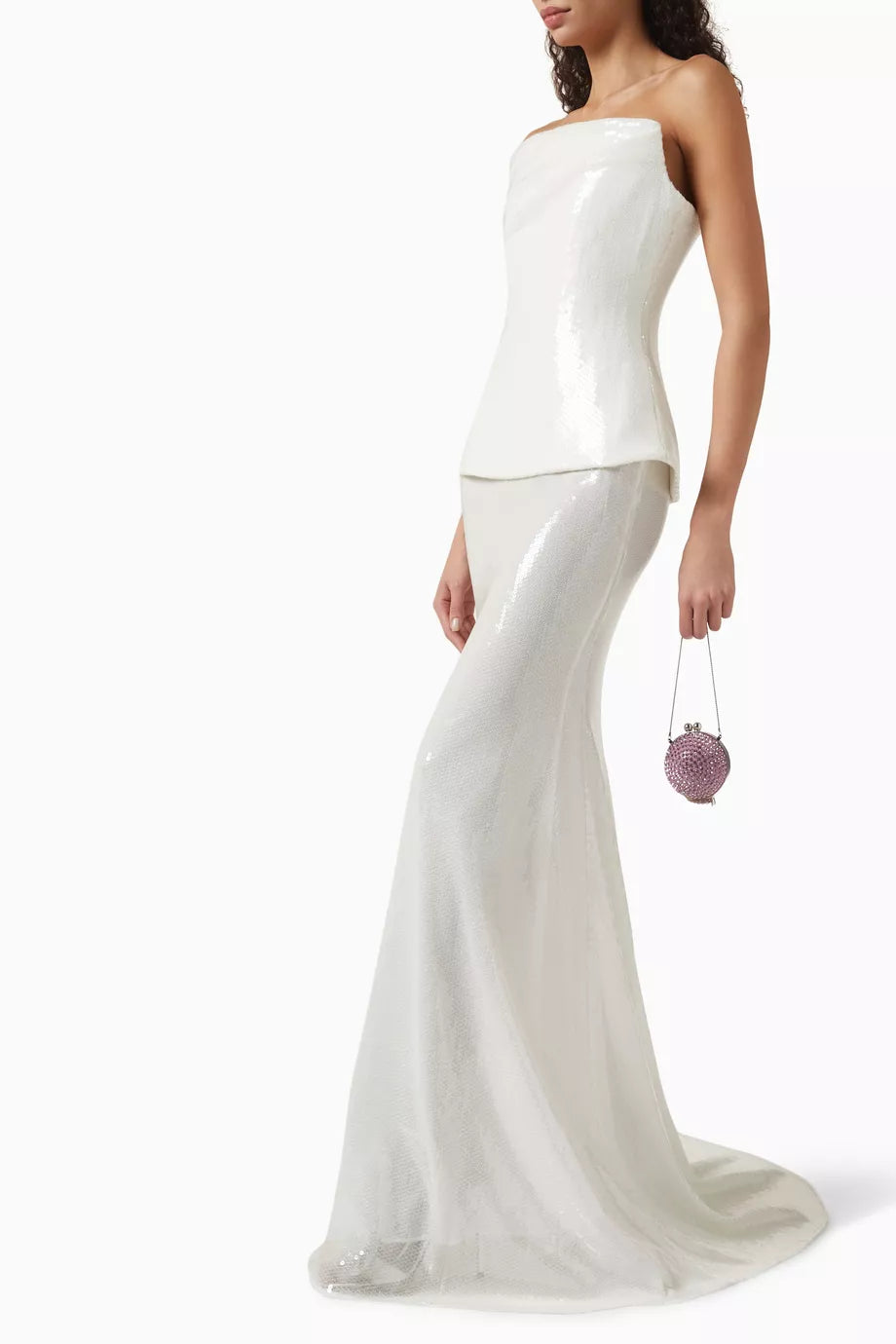 Make a statement in this Alex Perry sheer-skirt sequin-embellished gown. The corset bodice and stretch fabric will highlight your curves while the shimmering sequins add a touch of glamour. Perfect for galas and special occasions, all eyes will be on you. Elevate your style and serve up some drama!