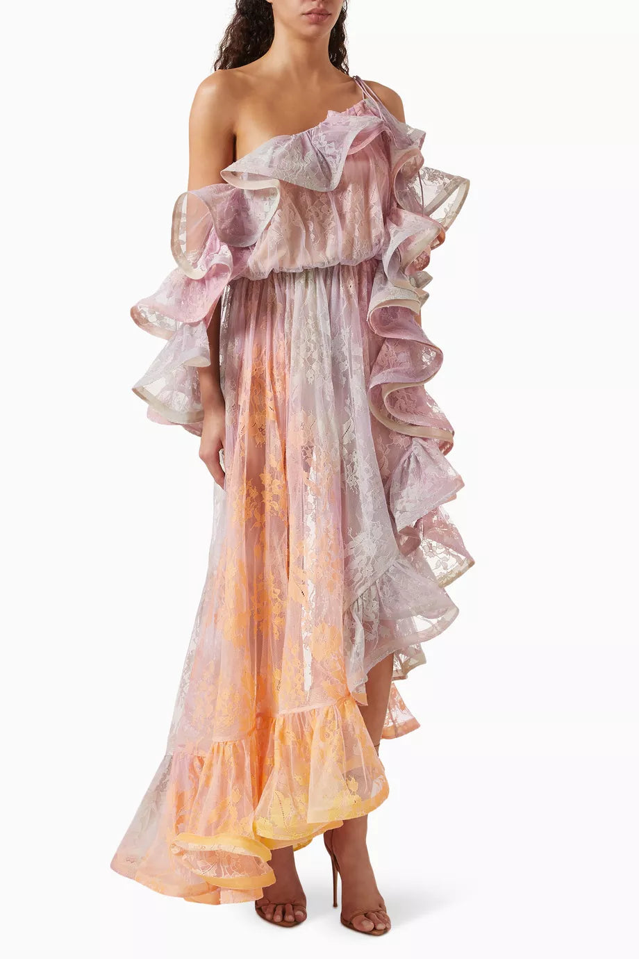 Step into the spotlight with the Dawning Ruffled Midi Dress in Lace from Zimmermann’s Spring 2025 Illumination Collection. This playful piece dazzles with asymmetric ruffles, a cape-style back, and a captivating side split flaunting a bold print. Perfect for turning heads at evening events, it pairs effortlessly with sleek heels and a chic clutch for a look that’s both dramatic and delightfully fun.