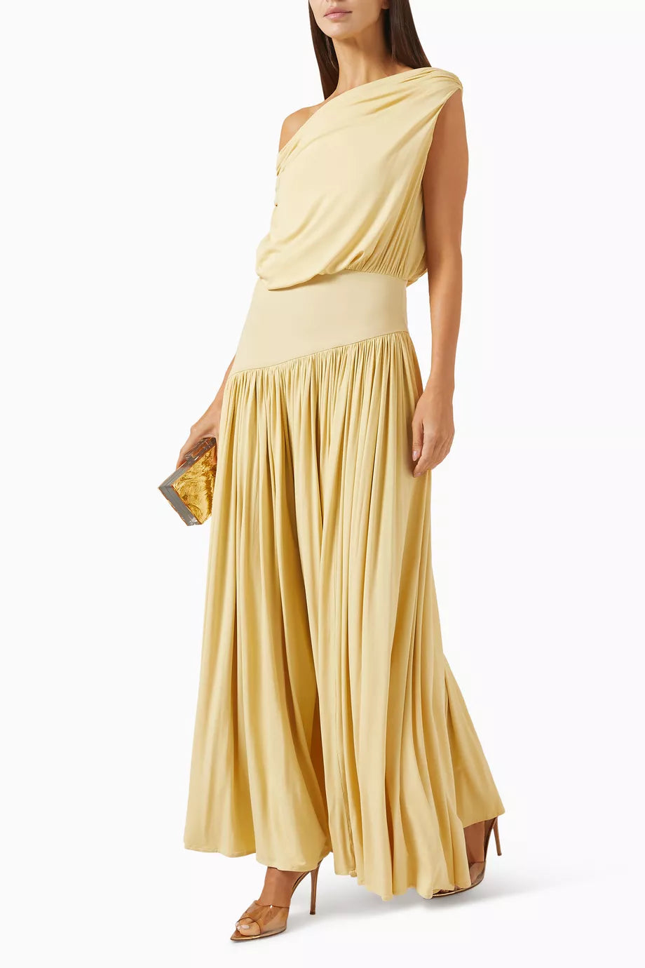 Discover effortless elegance with the Gwen Off-shoulder Dress by Abadia, crafted from luxuriously soft bamboo jersey that breathes with you throughout the day. The fabric's natural stretch ensures a flattering fit that moves with your body, while the graceful pleated skirt creates beautiful movement with every step. Style it your way—wear the neckline off-the-shoulder for a bold statement or draped to one side for understated sophistication. 