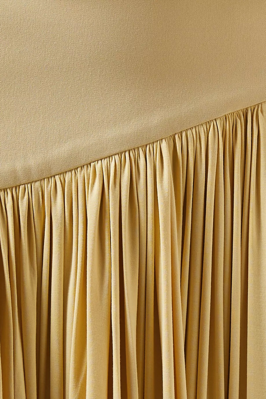 Discover effortless elegance with the Gwen Off-shoulder Dress by Abadia, crafted from luxuriously soft bamboo jersey that breathes with you throughout the day. The fabric's natural stretch ensures a flattering fit that moves with your body, while the graceful pleated skirt creates beautiful movement with every step. Style it your way—wear the neckline off-the-shoulder for a bold statement or draped to one side for understated sophistication. 