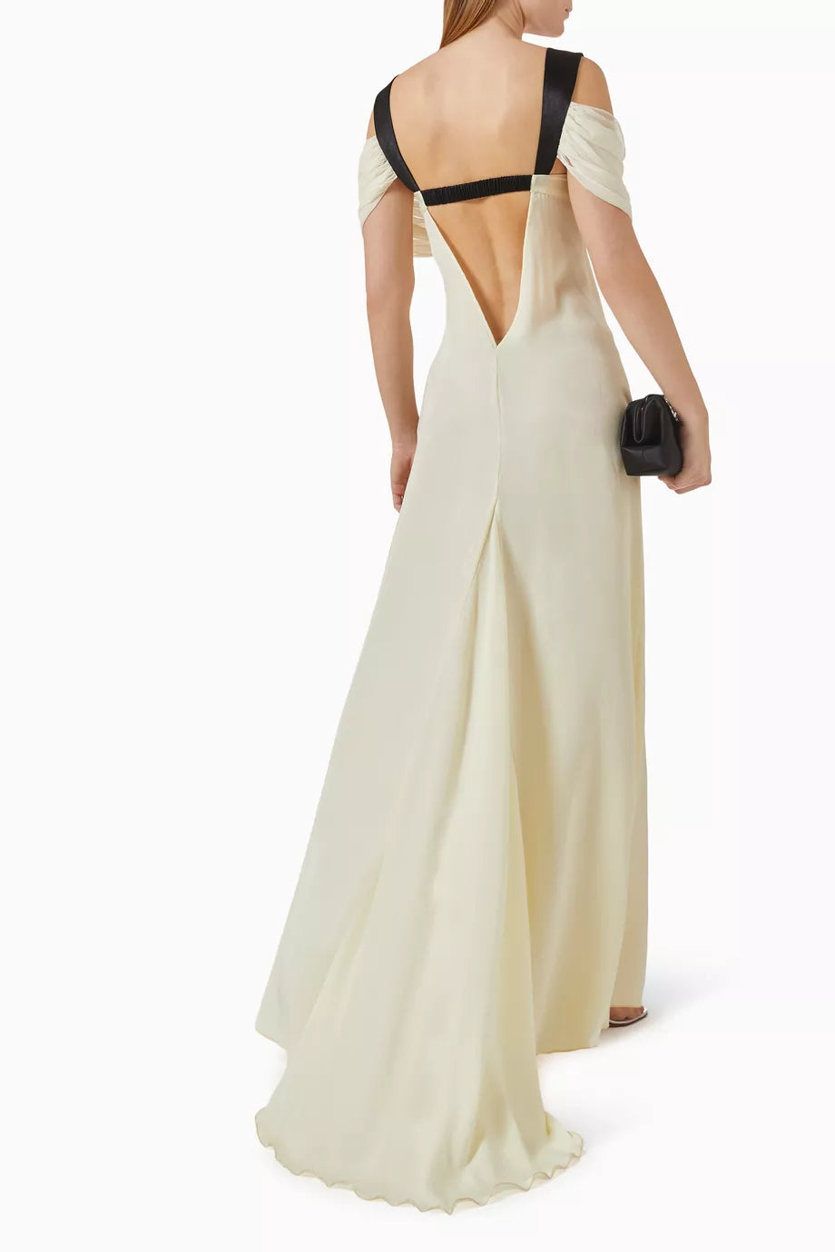 Elevate your evening elegance with the Elodie Off-shoulder Maxi Dress by Siedres, where timeless sophistication meets modern allure. Crafted from luxuriously flowing chiffon, this maxi dress drapes beautifully to create a graceful, elongated silhouette that flatters every frame. The striking off-shoulder neckline exudes romance and femininity, while the exquisite bow detail at the bodice serves as a stunning focal point that captures attention. 