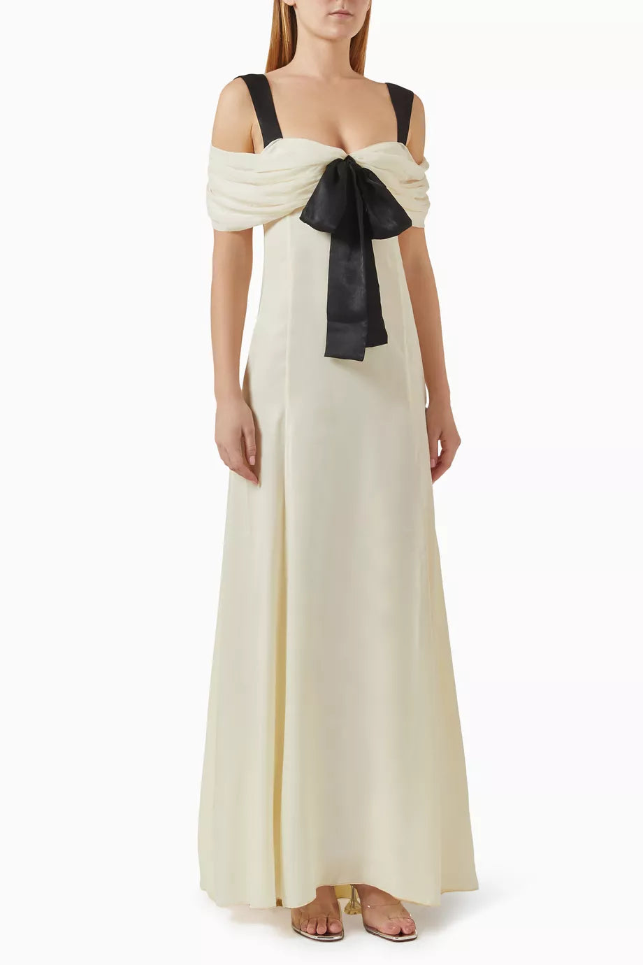 Elevate your evening elegance with the Elodie Off-shoulder Maxi Dress by Siedres, where timeless sophistication meets modern allure. Crafted from luxuriously flowing chiffon, this maxi dress drapes beautifully to create a graceful, elongated silhouette that flatters every frame. The striking off-shoulder neckline exudes romance and femininity, while the exquisite bow detail at the bodice serves as a stunning focal point that captures attention. 