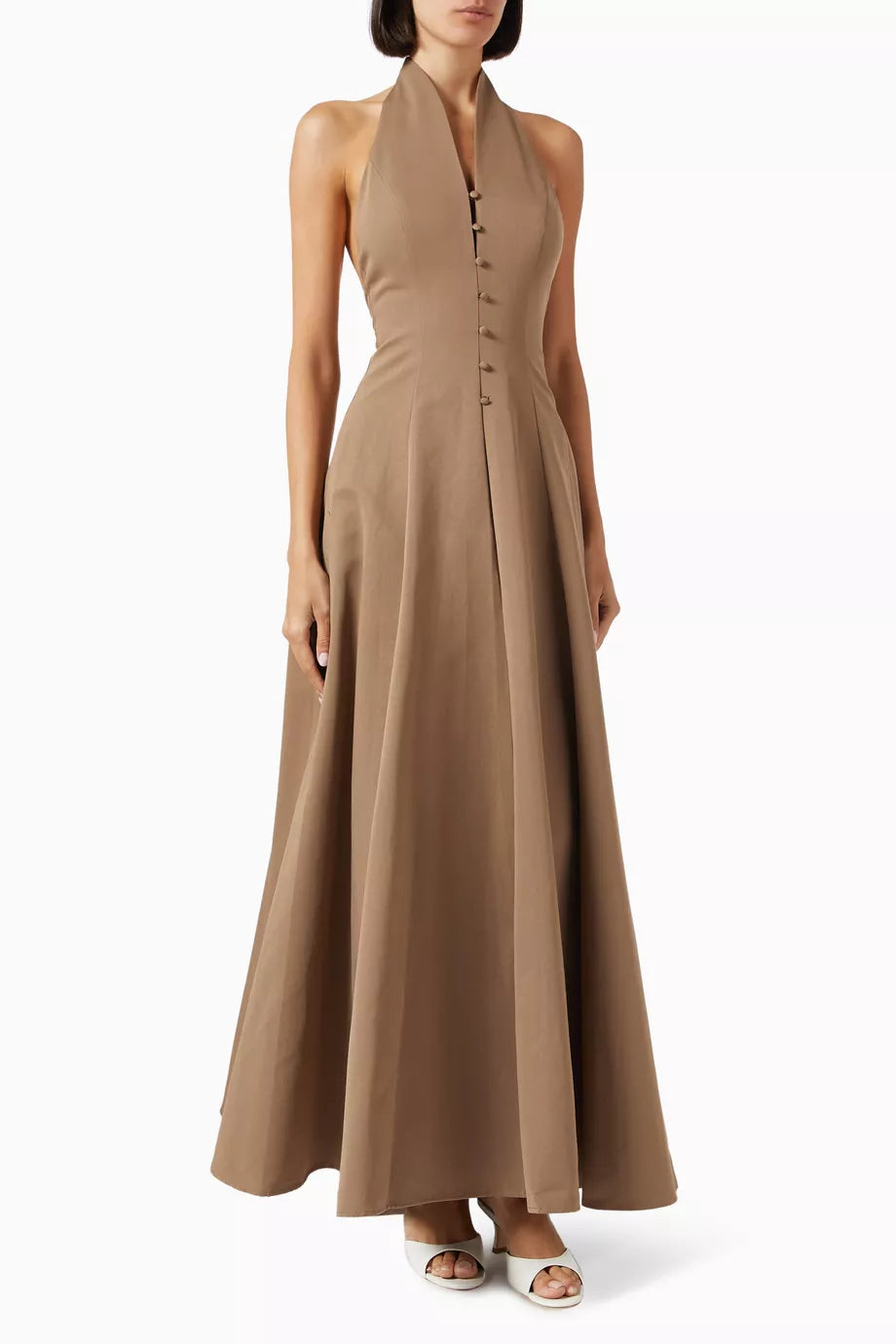 Effortlessly elegant, the Stella Maxi Dress from Staud is a must-have for your wardrobe. Made of a soft cotton blend, it features a fitted bodice and structured waistline, creating a stunning silhouette. Perfect for any occasion, this dress will make you feel confident and stylish.