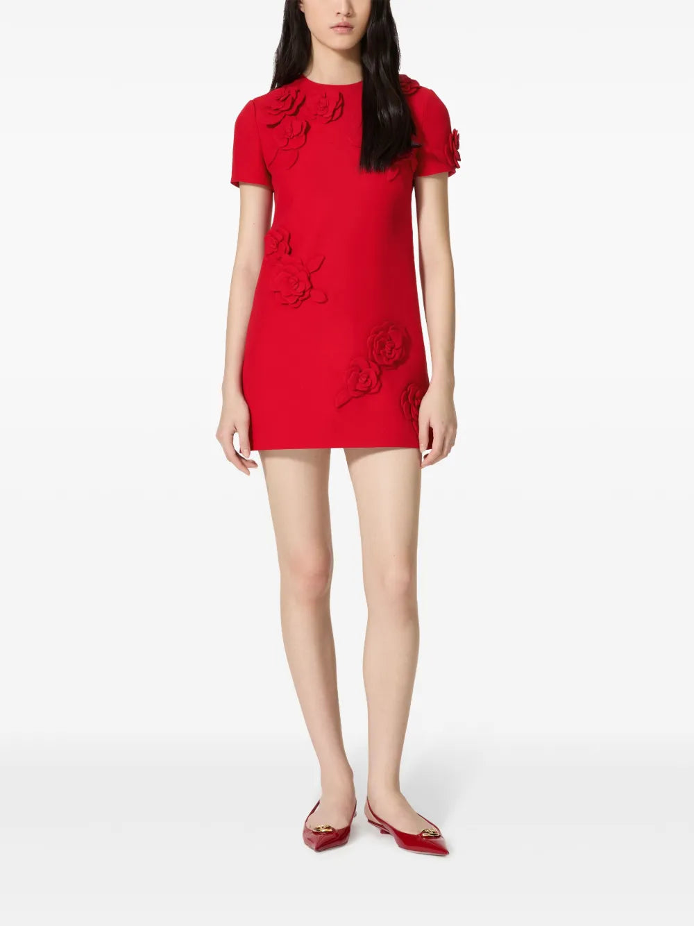 Elevate your wardrobe with the Flower Embroidered Crepe Couture Mini Dress by Valentino Garavani. Crafted from luxurious virgin wool and silk, this Italian-made dress blends elegance and delicate artistry with allover floral embroidered appliques. Its flattering shift silhouette, round neckline, and short sleeves create a timeless yet modern look, while the invisible back zip ensures a sleek finish. 