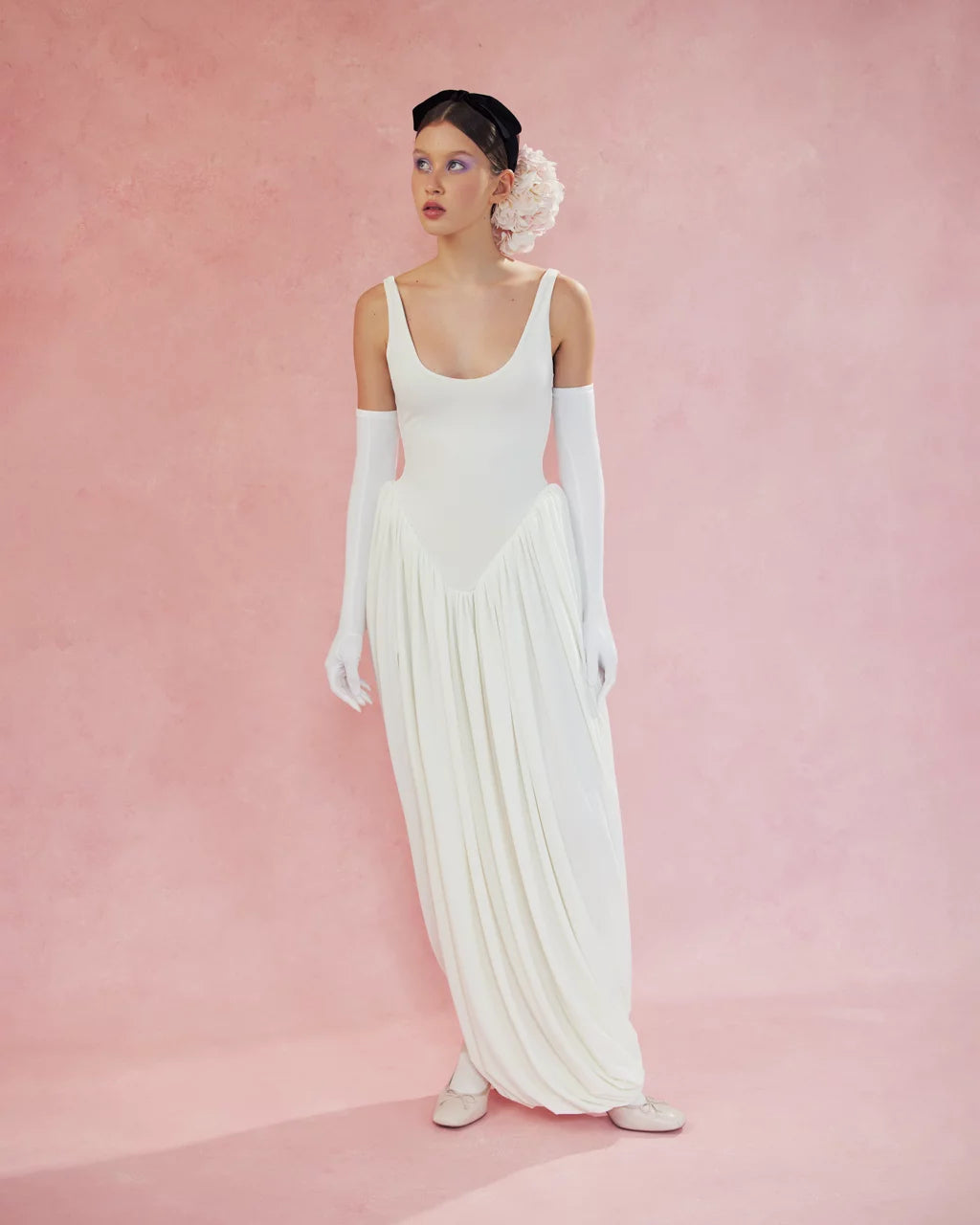 Elevate your style with the Cleopatra Maxi Dress. Accentuated thigh line and bodysuit-inspired shape create a flattering silhouette while the slit adds a touch of sultry charm. Embrace your inner queen and make a statement in this must-have piece!