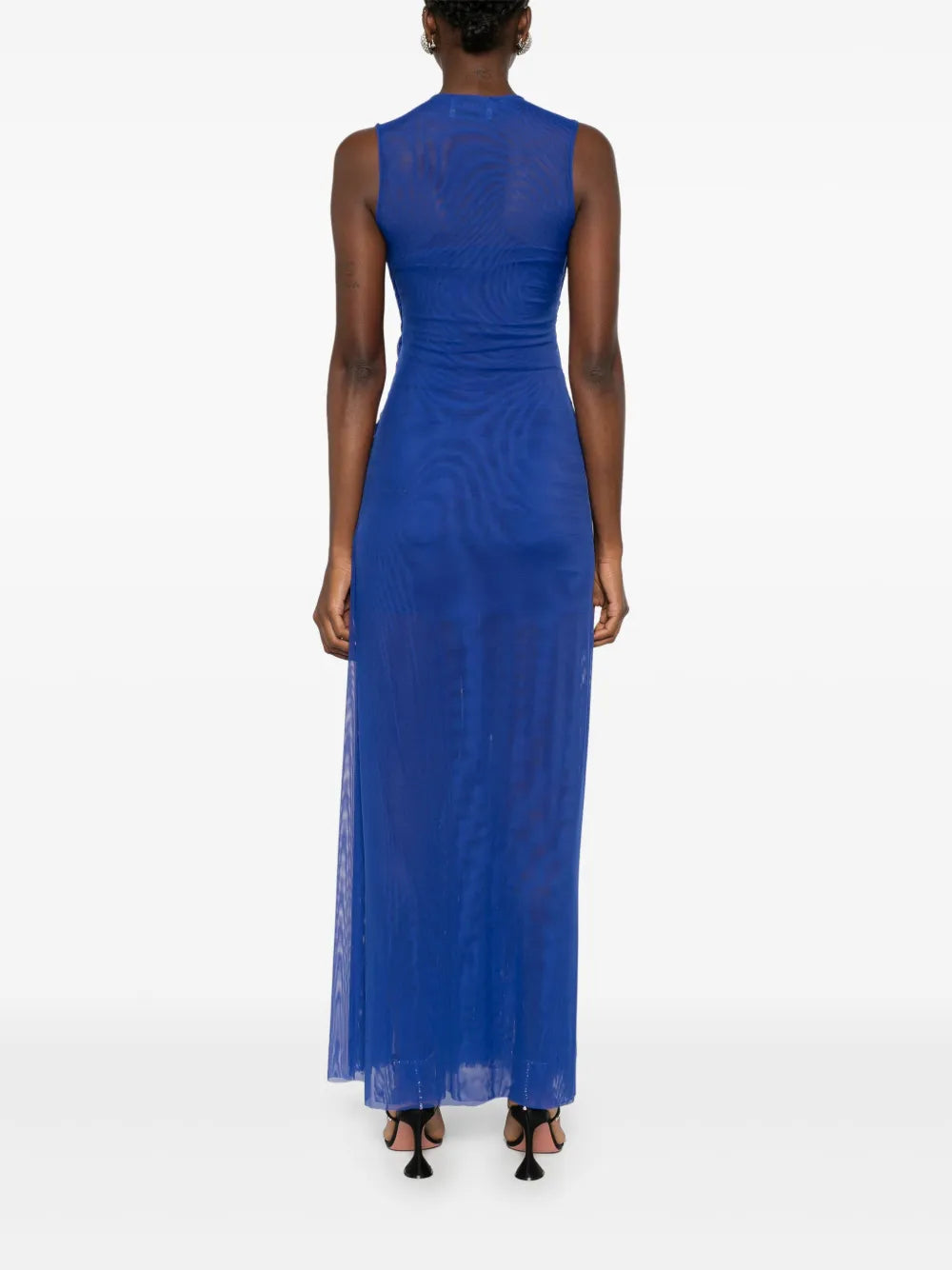Embrace elegance with the Emotional braided maxi dress by Atu Body Couture. This stunning royal blue creation features intricate braid detailing and gathered accents that flow beautifully across a fully pleated silhouette. The mesh design adds an alluring touch, while the draped crew neck and sleeveless cut offer modern sophistication. The dramatic high-low hem transitions to a floor-length finish, creating movement with every step. 