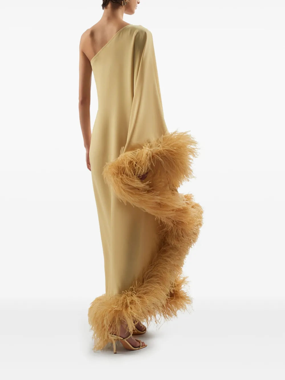 Elevate your style with the Ubud dress by Taller Marmo, crafted in Italy for a touch of refined elegance. This mustard yellow standout features a unique one-shoulder design with a single long sleeve, perfectly complemented by delicate feather detailing. The side zip fastening ensures a flawless fit, making it ideal for special occasions where you want to impress effortlessly.