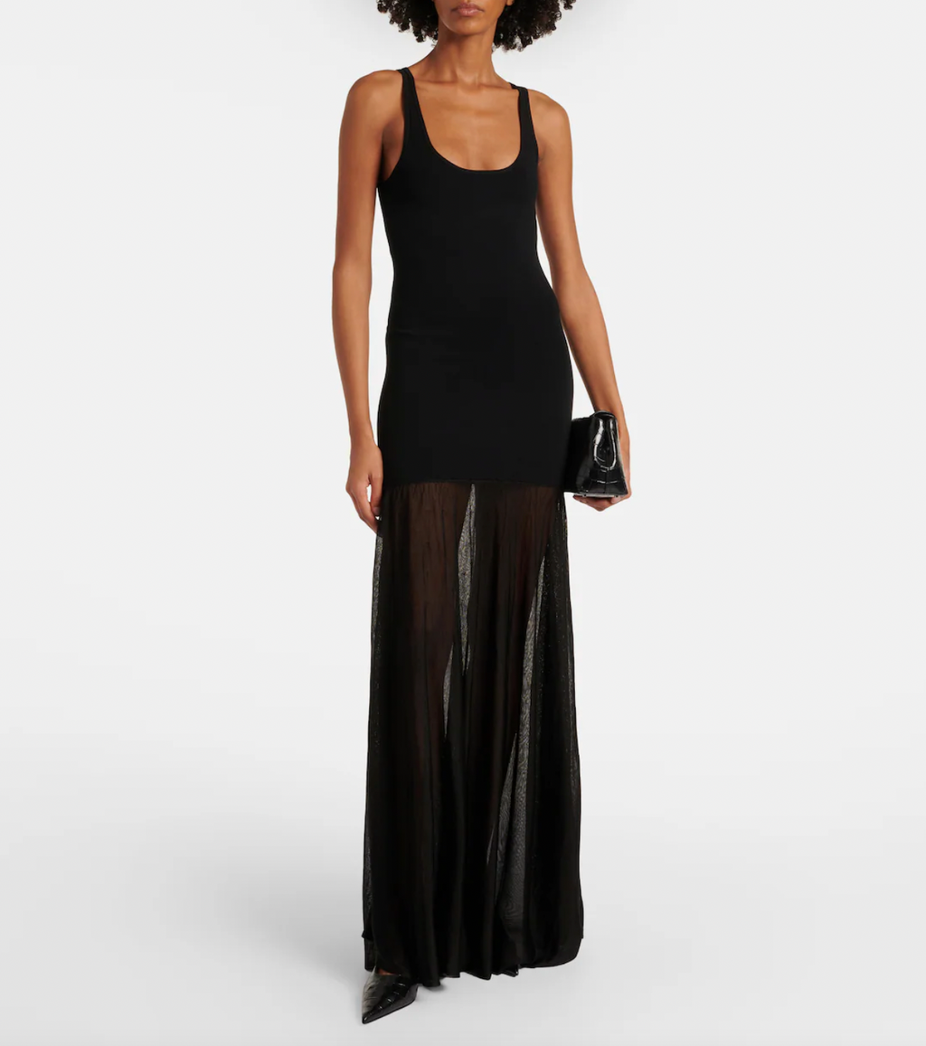 Elevate your evening look with this sleek black maxi dress by Toteme. Featuring a fine knit fabric and a panelled design, it offers both comfort and subtle sophistication. The sleeveless scoop neck and unlined construction keep the silhouette light and breathable, while the flared, long skirt adds graceful movement. Perfect for formal occasions, this dress combines understated elegance with a modern edge.