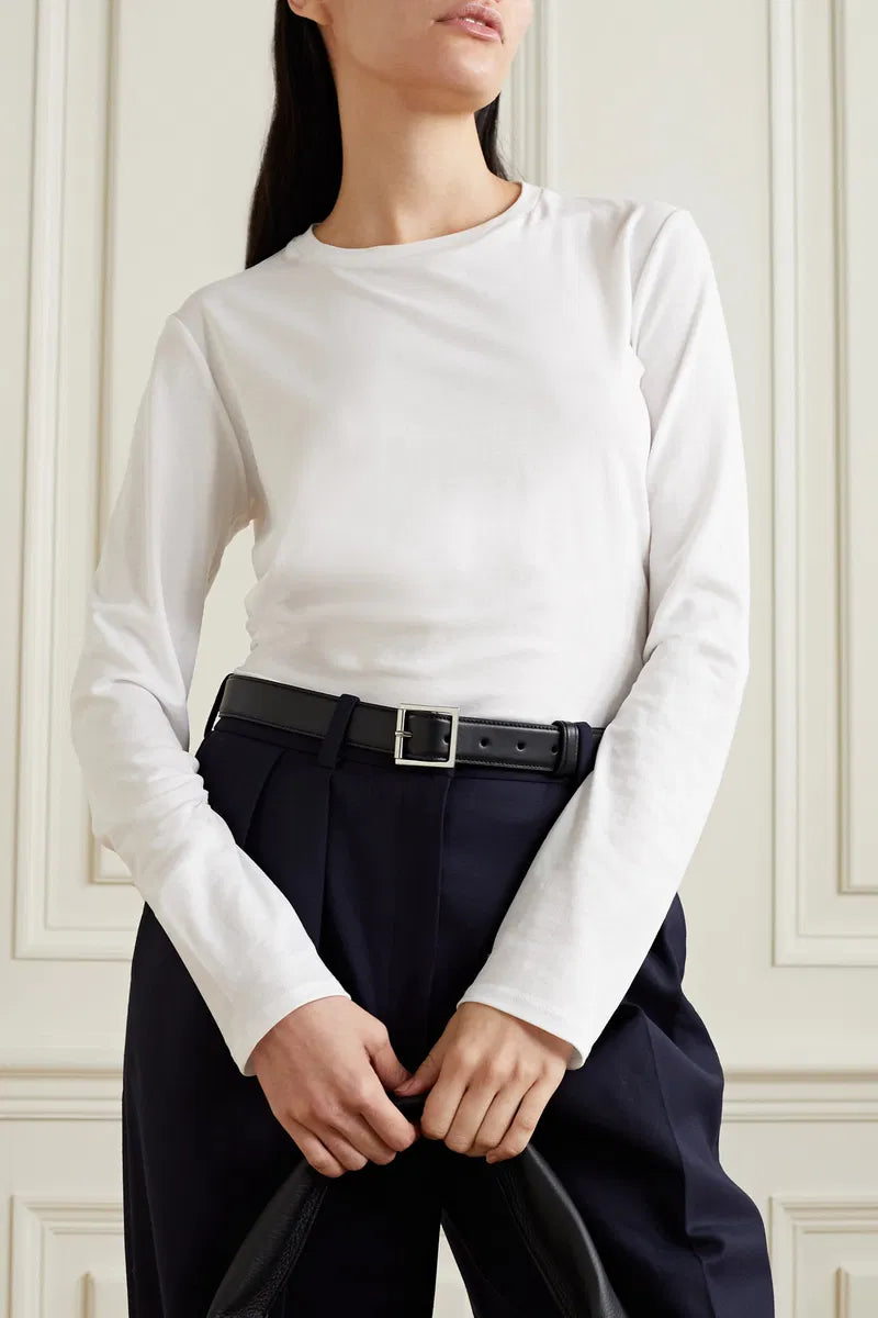 The Sherman Cotton-Jersey Top by The Row is your wardrobe's most versatile essential. Crafted from supremely soft, lightweight cotton-jersey, this slim-fitting classic features a timeless crew neck that transitions effortlessly from layering piece to standalone statement. Its refined simplicity makes it the perfect foundation for any look—pair it with high-rise jeans for an instantly polished ensemble, or style it your way. Invest in quality basics that work as hard as you do.