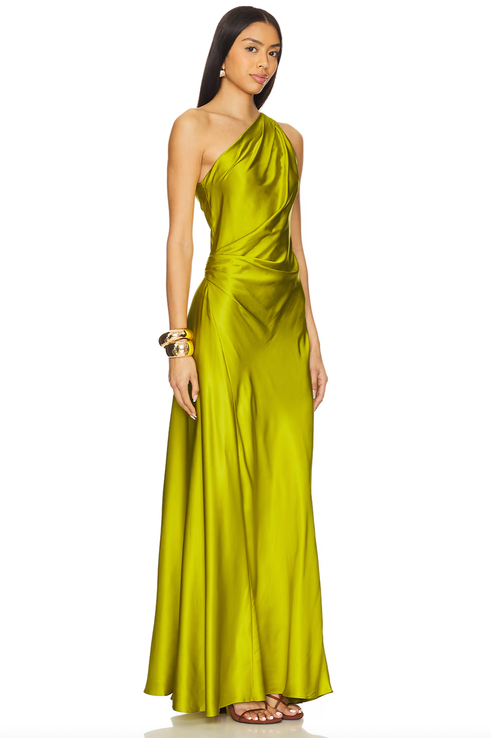 The Aster Satin One Shoulder Gown features a fully lined interior for optimal comfort and structure. Its hidden side zipper ensures a seamless silhouette, while the ruffled satin fabric adds sophisticated texture and movement. Perfect for formal occasions, this gown combines elegant design with practical details for a refined look.