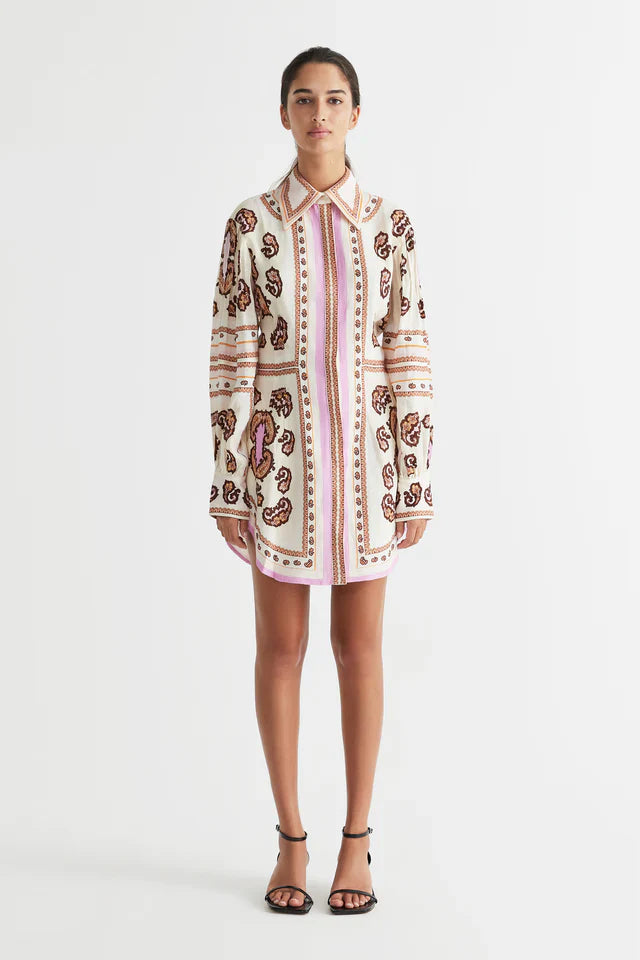 Elevate your style with the Jagger Fitted Waist Mini Dress by Antipodean. Made from luxurious linen, it boasts a hand-drawn print and balloon sleeves for a flattering silhouette. With a concealed placket, this dress is perfect for any occasion and a must-have for any wardrobe.