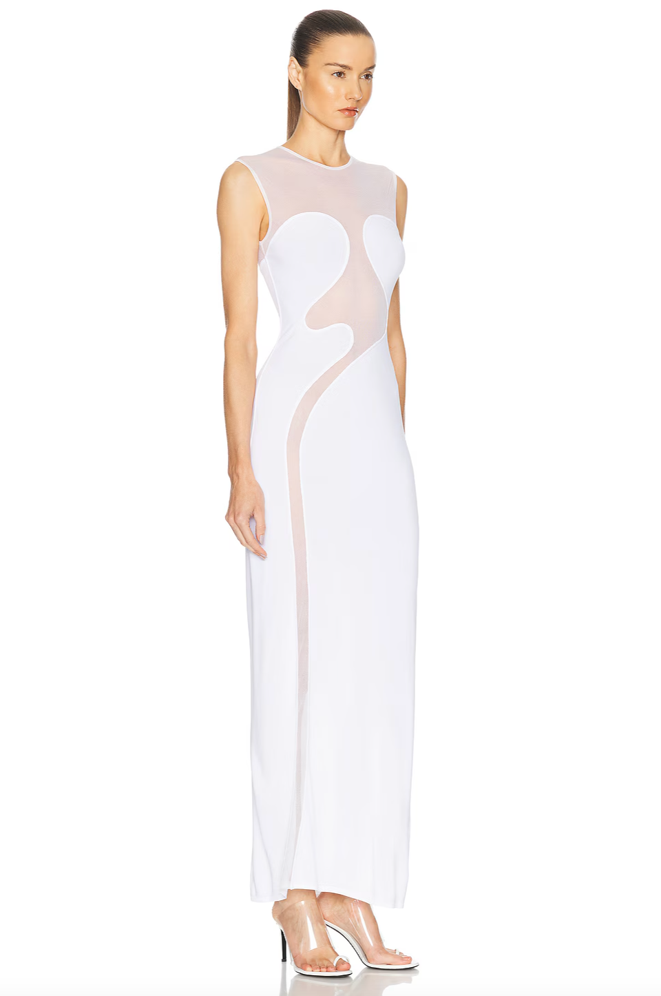 Alaïa’s Molded Dress in mesh is expertly tailored to flatter your natural curves effortlessly. Crafted from subtly stretchy fabric, it promises comfort without compromising on fit. Sheer mesh panels introduce a refined allure, delivering a tasteful hint of elegance that enhances the dress’s sleek silhouette. Ideal for occasions when you want to make a confident, understated statement.