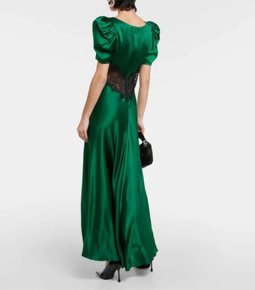 Expertly crafted by Rodarte, this Women's Green Silk Lace Long Dress boasts a stunning design and elegant silhouette. Made of luxurious silk, this dress features delicate lace detailing that adds a touch of femininity. Perfect for any formal occasion, this dress is a must-have for any fashion-forward woman.
