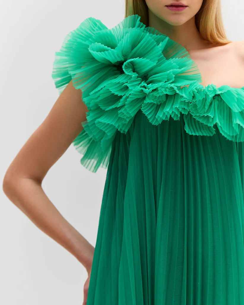 Elevate your style with the Pleated One Shoulder Gown. Made from luxurious pleated chiffon, this dress features a dramatic one shoulder neckline, adding a touch of glamour to your look. Be a part of the Spring 2024 Runway Collection and make a statement at your next event. Fully lined for maximum comfort.